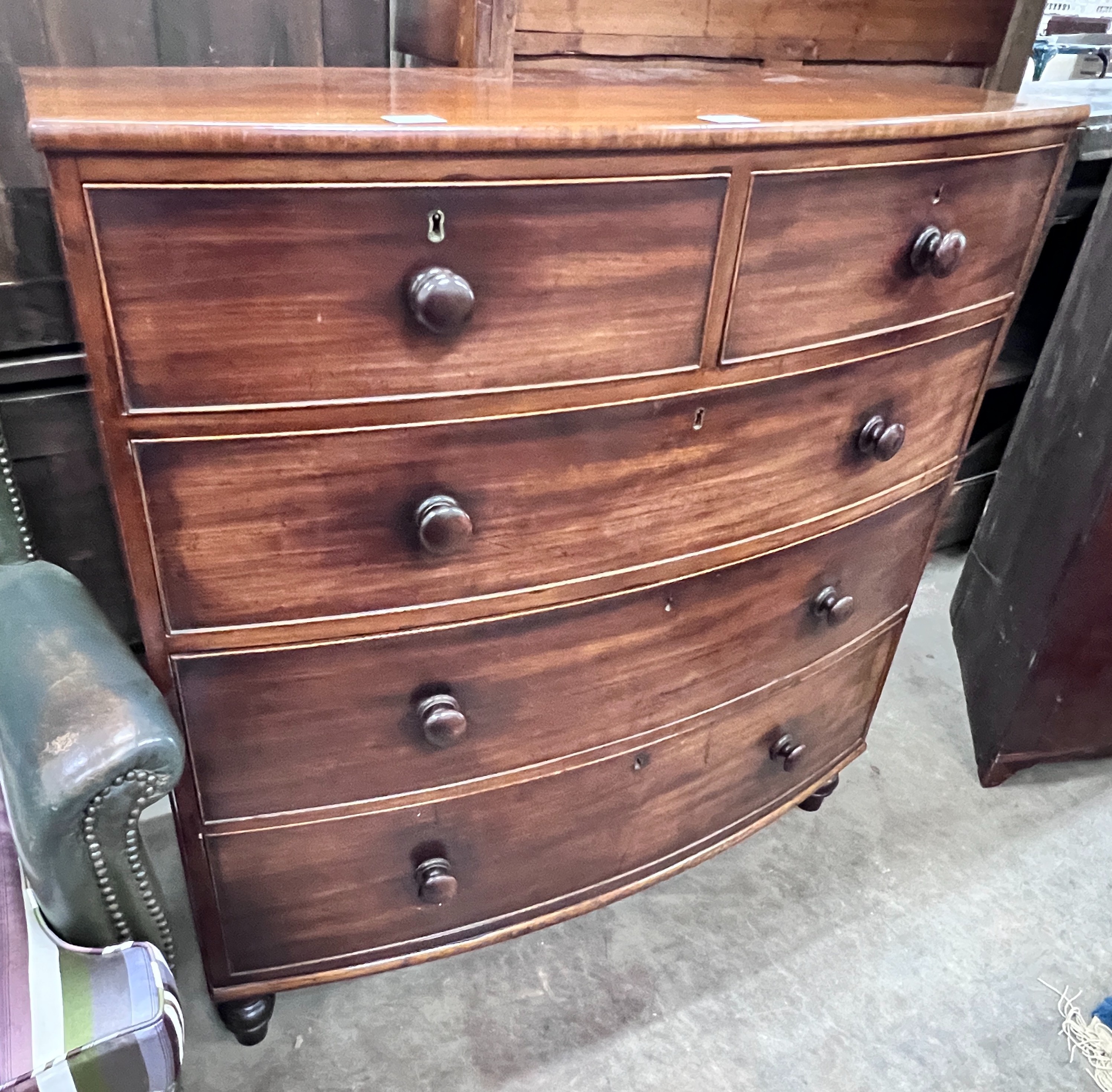 An early Victorian mahogany bow front chest of two short and three long drawers, width 107cm, depth 52cm, height 113cm